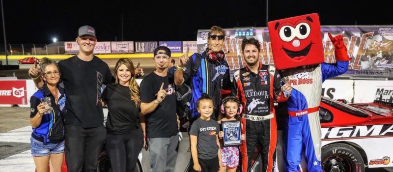 Dustin Ash celebrates with family and crew after his win Saturday night.