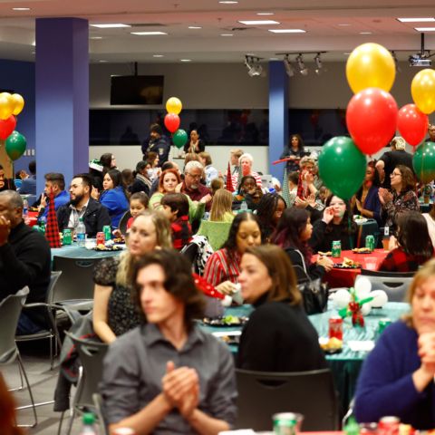 Charity organizations and guests waiting for their organizations check presentation