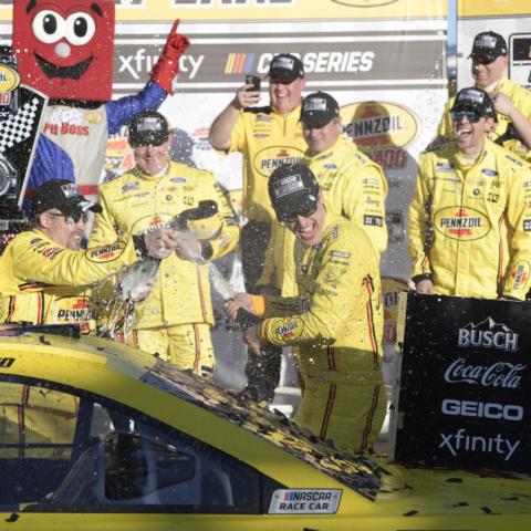 Joey Logano took the checkered flag in the Pennzoil 400 presented by Jiffy Lube for the second consecutive year at LVMS.