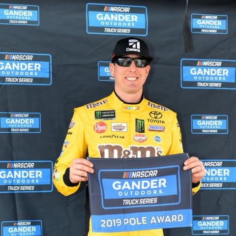 Las Vegas' Kyle Busch set a NASCAR Gander Outdoors Truck Series track record while winning the pole for Friday night's Strat 200.
