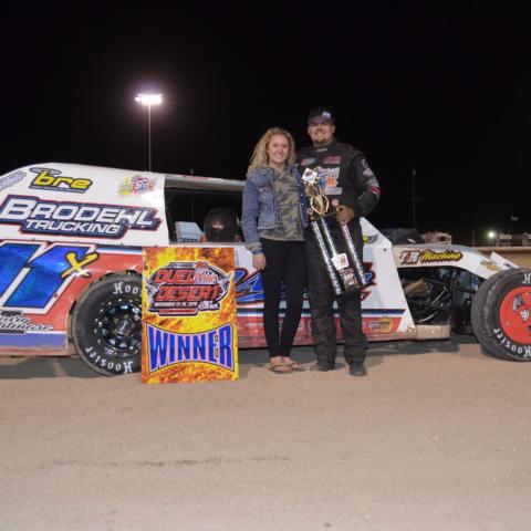 Tom Berry Jr. won the first of two IMCA Modified qualifying features on the first night of the 22nd Annual Duel in the Desert at the LVMS Dirt Track on Thursday night.