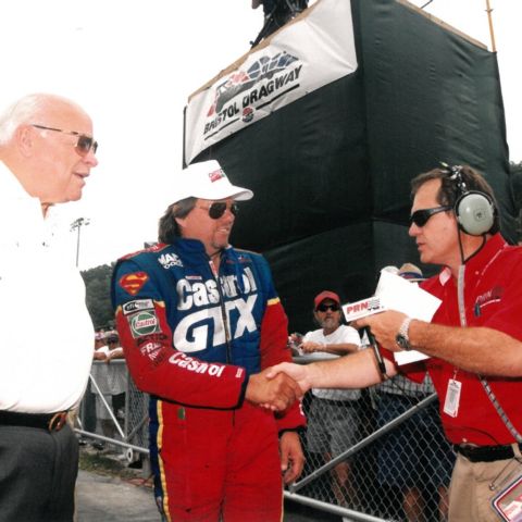 Doug Rice interviews 16-time NHRA Funny Car Champion driver John Force alongside Speedway Motorsports founder Bruton Smith ahead of the Bristol NHRA race.