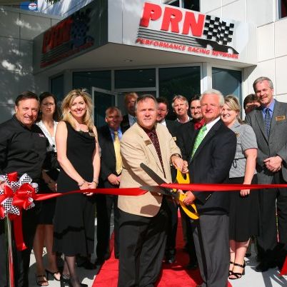 Doug Rice, Concord mayor Scott Padgett and the PRN team at the ribbon cutting for the network’s studios at Charlotte Motor Speedway in 2008.
