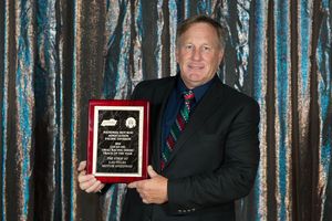 Jeff Foster, director of racing operations at The Strip at LVMS, accepted the Track of the Year award on behalf of the track at the annual NHRA Pacific Division Awards Banquet.