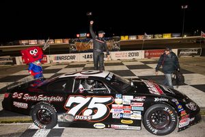 Jeremy Doss celebrated his birthday in the Winner's Circle at The Bullring after taking the checkered flag in the SPEARS Southwest Tour Series race at the West Coast Short Track Championships on Saturday night.