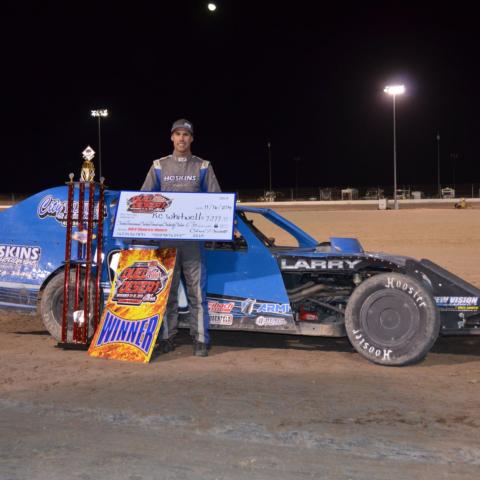 R.C. Whitwell added his name to the LVMS Dirt Track record books by winning the IMCA Modifieds main event at the 22nd Annual Duel in the Desert on Saturday night.