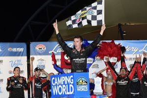 Ben Rhodes held off Christopher Bell to earn his first career NASCAR Camping World Truck Series victory at the Las Vegas 350 on Saturday night.