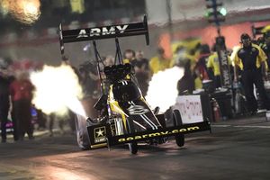 Tony Schumacher set an ET track record in the Top Fuel class during the second qualifying round at the NHRA Toyota Nationals on Friday.