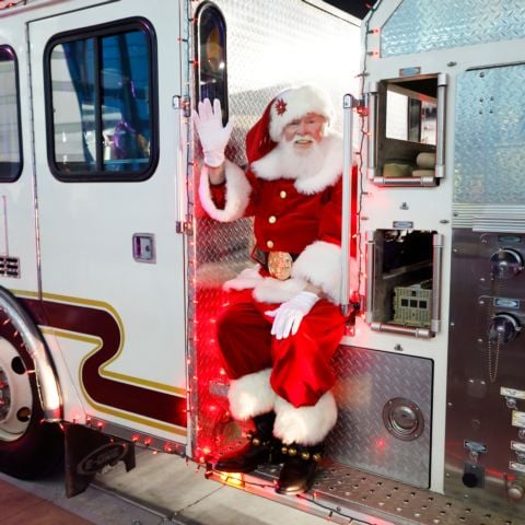 Santa arriving to LVMS on firetruck